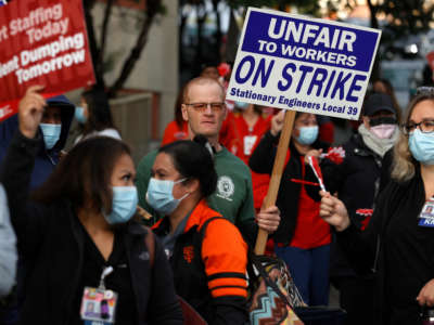 Kaiser Permanente nurses and workers stage an informational picket outside of the Kaiser Permanente San Francisco Medical Center on November 10, 2021, in San Francisco, California.