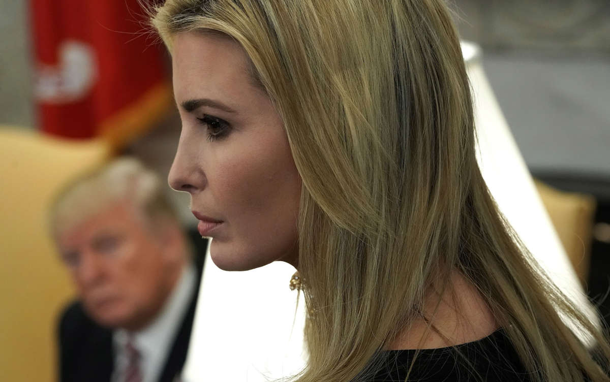 President Donald Trump and adviser and daughter Ivanka Trump listen during a working session in the Oval Office of the White House on February 14, 2018, in Washington, D.C.