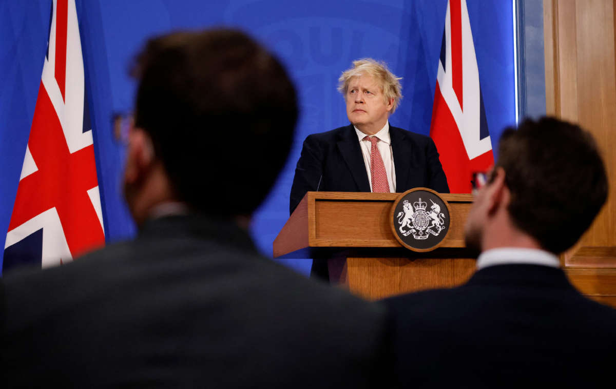 Britain's Prime Minister Boris Johnson attends a press conference inside the Downing Street Briefing Room in central London on February 21, 2022.