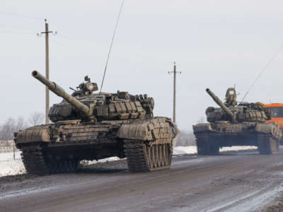 A column of Russian military vehicles is seen near the village of Oktyabrsky, Belgorod Region, near the Russian-Ukrainian border, on February 26, 2022.