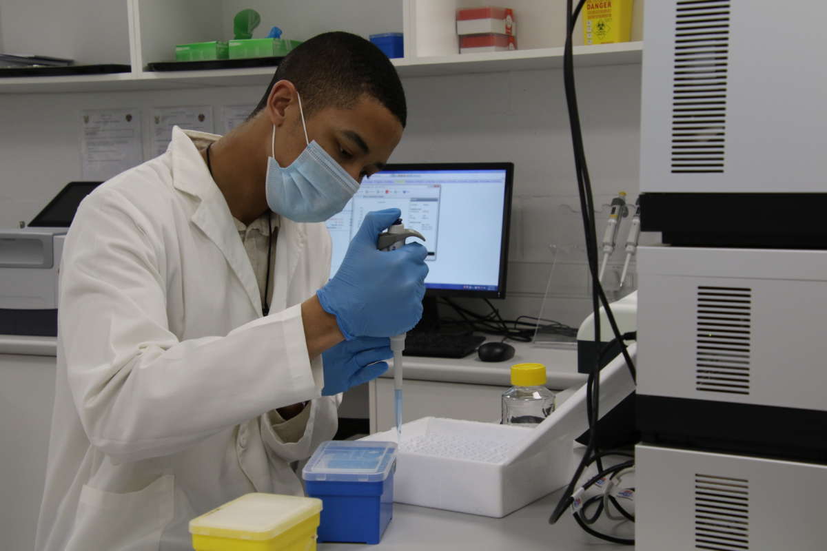 Researcher Emile Hendricks works in Afrigen's analytical laboratory in Cape Town, South African, on December 10, 2021.