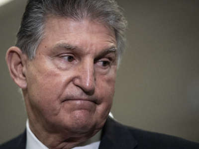 Sen. Joe Manchin speaks to reporters after a closed door briefing at the U.S. Capitol Building on February 3, 2022, in Washington, D.C.