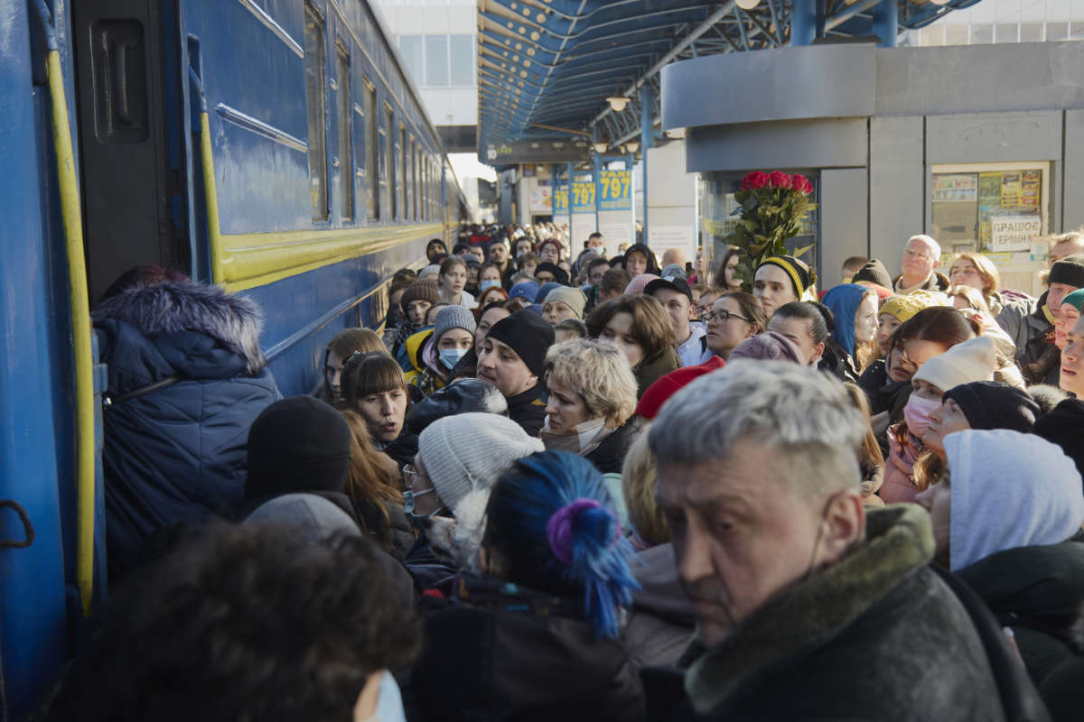 Local residents are boarding an evacuation train driving to the west of Ukraine on February 26, 2022, in Kyiv, Ukraine.