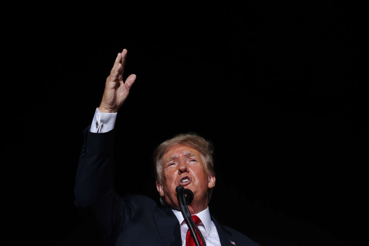 Donald Trump addresses supporters during a rally at York Family Farms on August 21, 2021, in Cullman, Alabama.