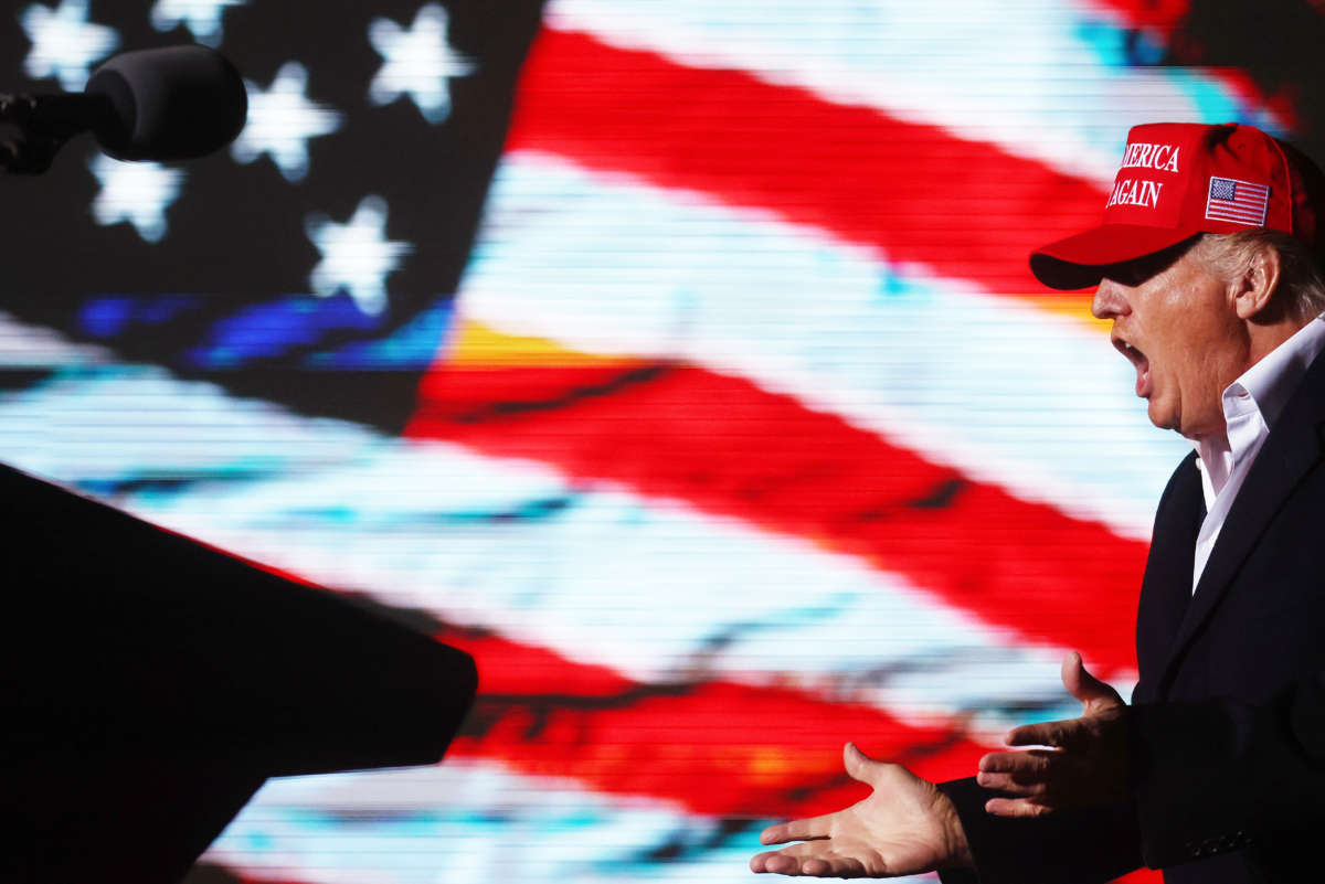 Former President Donald Trump prepares to speak at a rally at the Canyon Moon Ranch festival grounds on January 15, 2022, in Florence, Arizona.