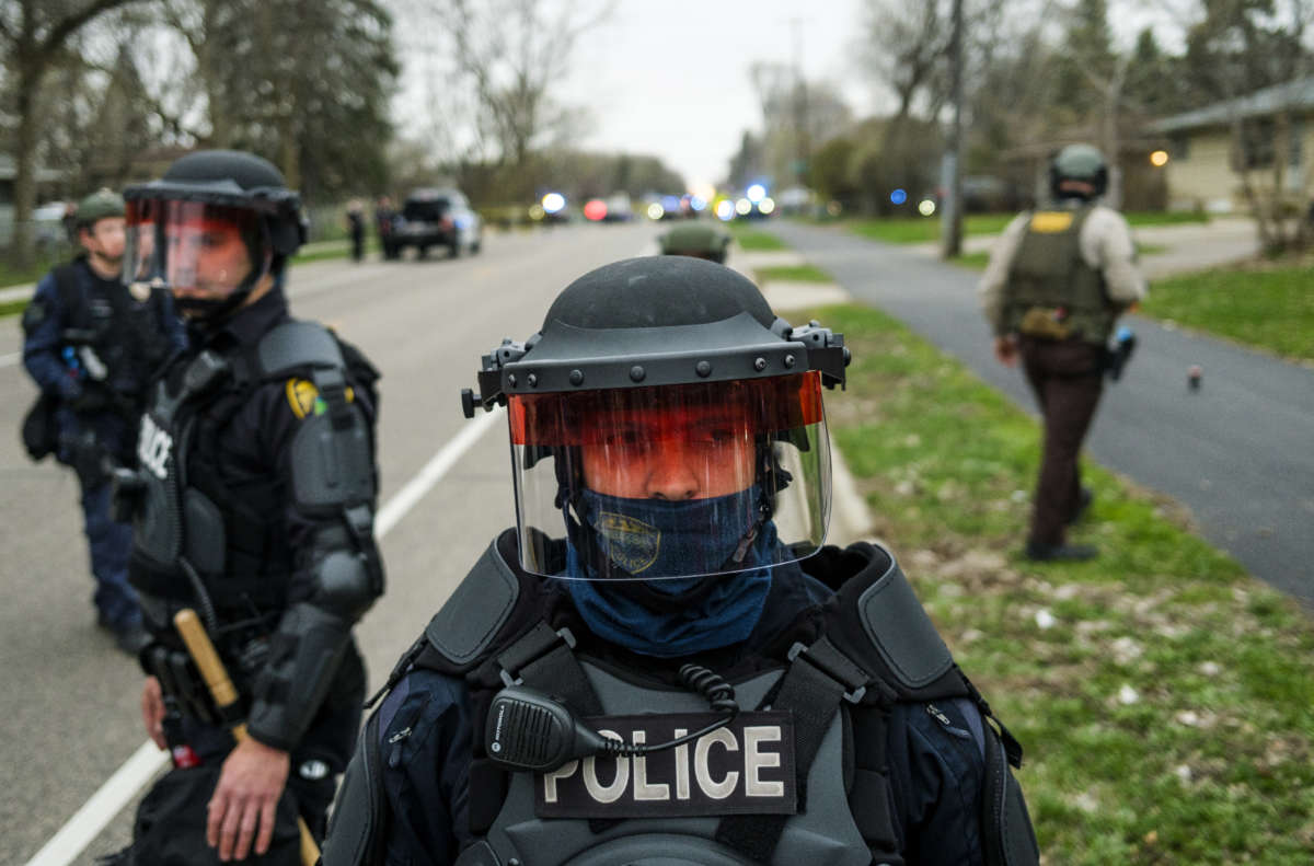 Police form a line as demonstrators gather on April 11, 2021, in Brooklyn Center, Minnesota.