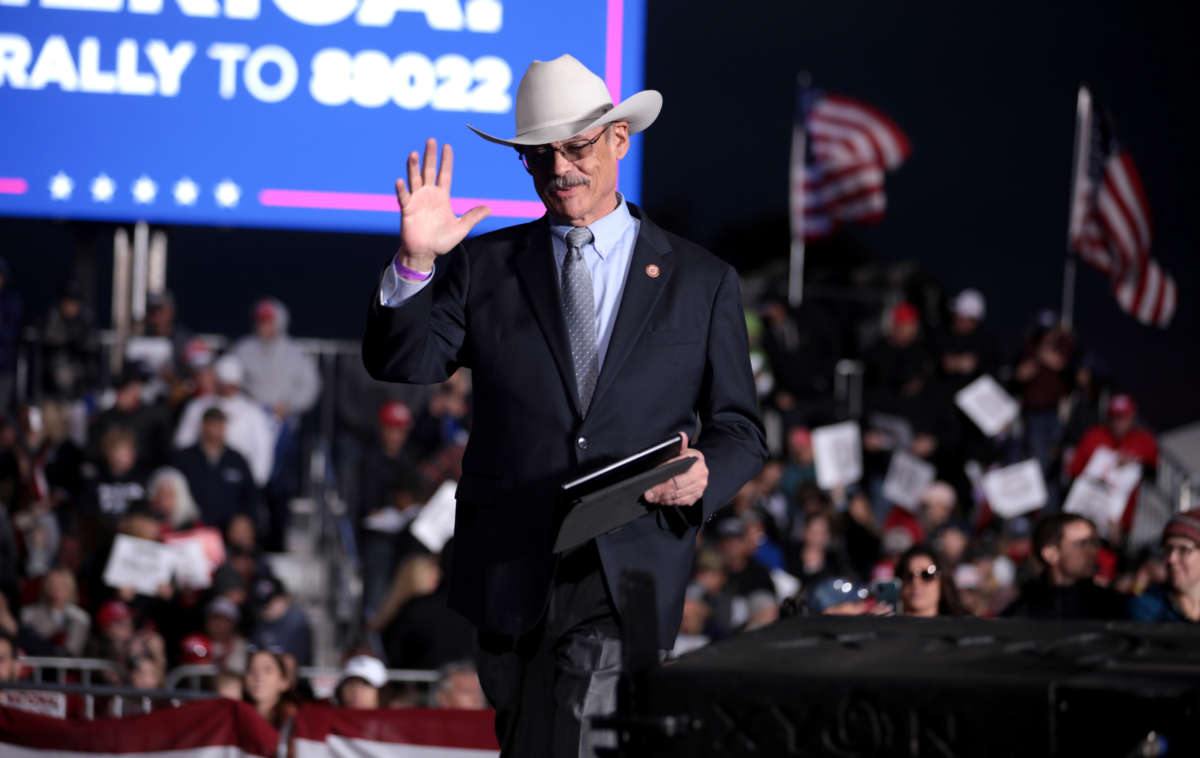 State Representative Mark Finchem speaks with attendees at a Save America rally at Country Thunder Arizona in Florence, Arizona, on January 15, 2022.