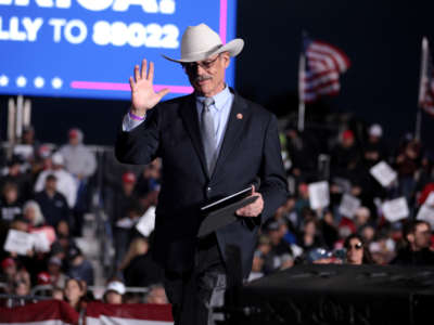 State Representative Mark Finchem speaks with attendees at a Save America rally at Country Thunder Arizona in Florence, Arizona, on January 15, 2022.