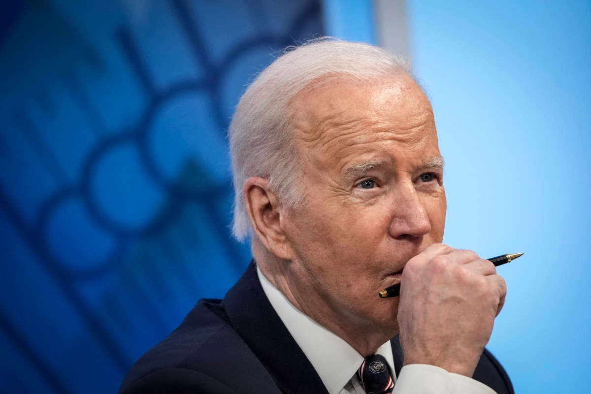 President Joe Biden participates in a virtual meeting in the South Court Auditorium of the White House complex on February 22, 2022, in Washington, D.C.