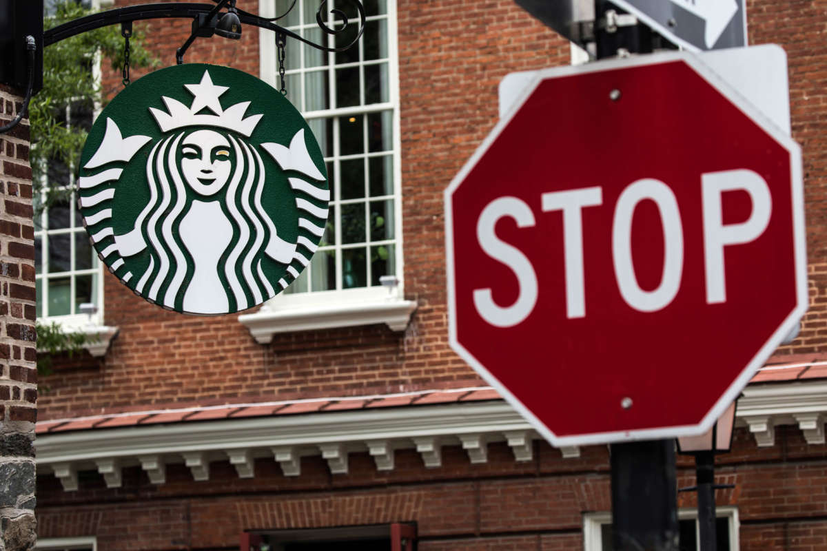A Starbucks sign is seen in Washington on May 29, 2018.