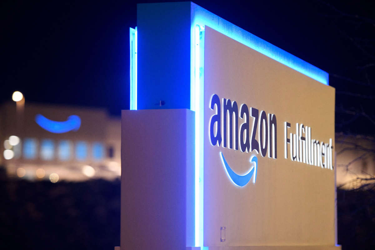 A sign at the Amazon.com, Inc. BHM1 fulfillment center is seen before sunrise on March 29, 2021, in Bessemer, Alabama.