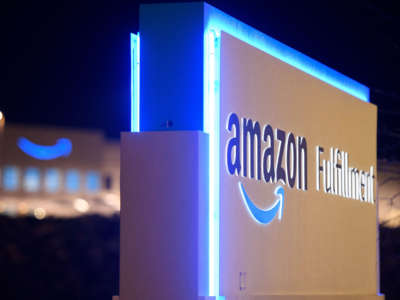 A sign at the Amazon.com, Inc. BHM1 fulfillment center is seen before sunrise on March 29, 2021, in Bessemer, Alabama.