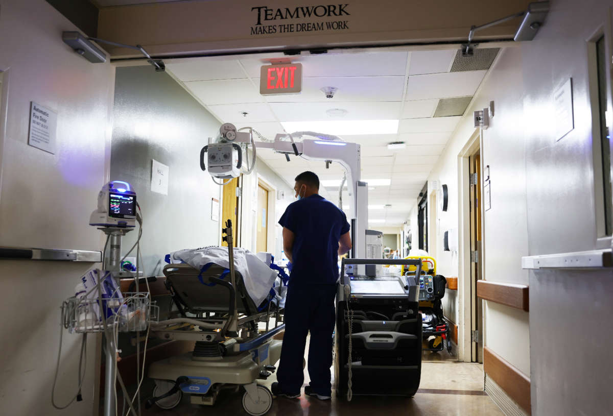 A clinician cares for a patient in the Emergency Department at Providence St. Mary Medical Center on March 11, 2022, in Apple Valley, California.