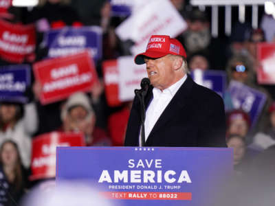 Former President Donald Trump speaks to the crowd during a rally at the Florence Regional Airport on March 12, 2022, in Florence, South Carolina.