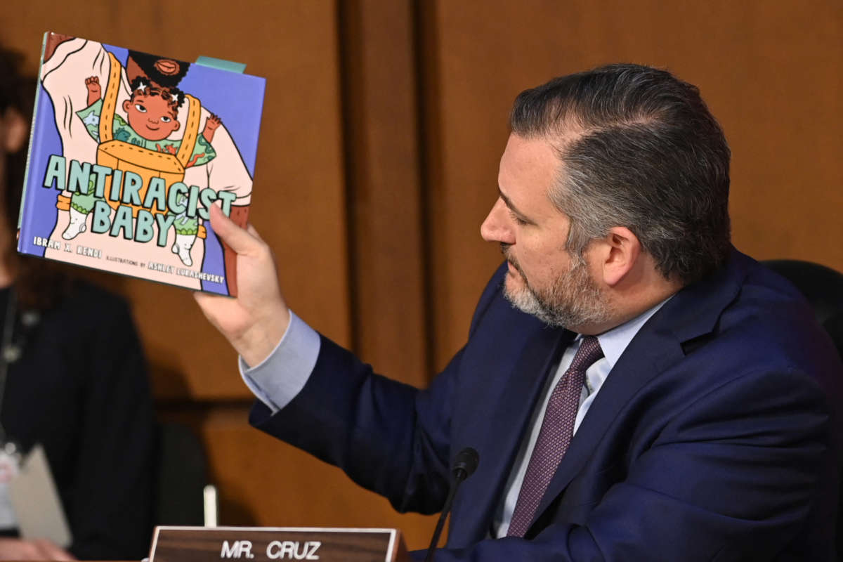 Sen. Ted Cruz holds a book titled Antiracist Baby while speaking during the confirmation hearing for Judge Ketanji Brown Jackson before the Senate Judiciary Committee on her nomination to be an Associate Justice on the Supreme Court, in the Hart Senate Office Building on Capitol Hill in Washington, D.C., on March 22, 2022.