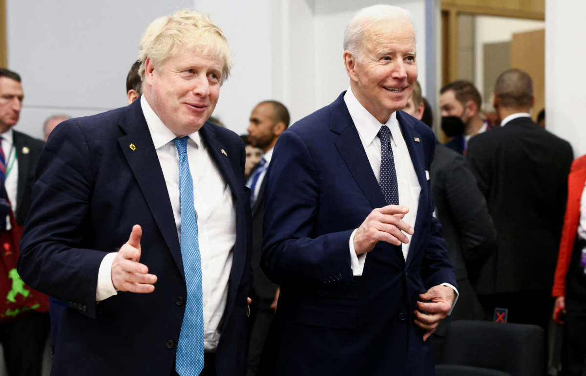 British Prime Minister Boris Johnson and U.S. President Joe Biden arrive for a G7 leaders meeting during a NATO summit at the alliance's headquarters in Brussels, on March 24, 2022, in Brussels, Belgium.