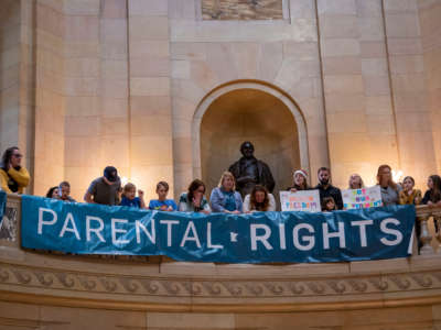 A banner reading Parental Rights is seen at a rally at the Minnesota state capitol in St. Paul on February 3, 2022.