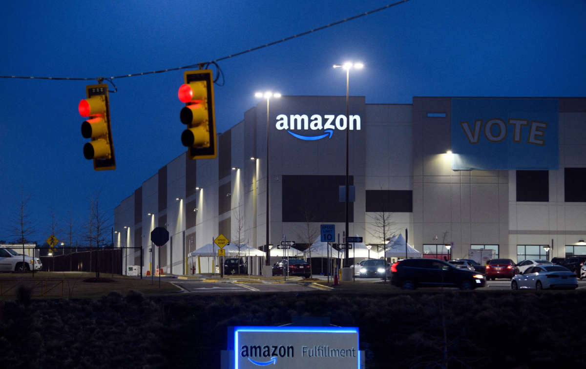 A Vote banner hangs at an Amazon fulfillment center early on March 27, 2021, in Bessemer, Alabama.