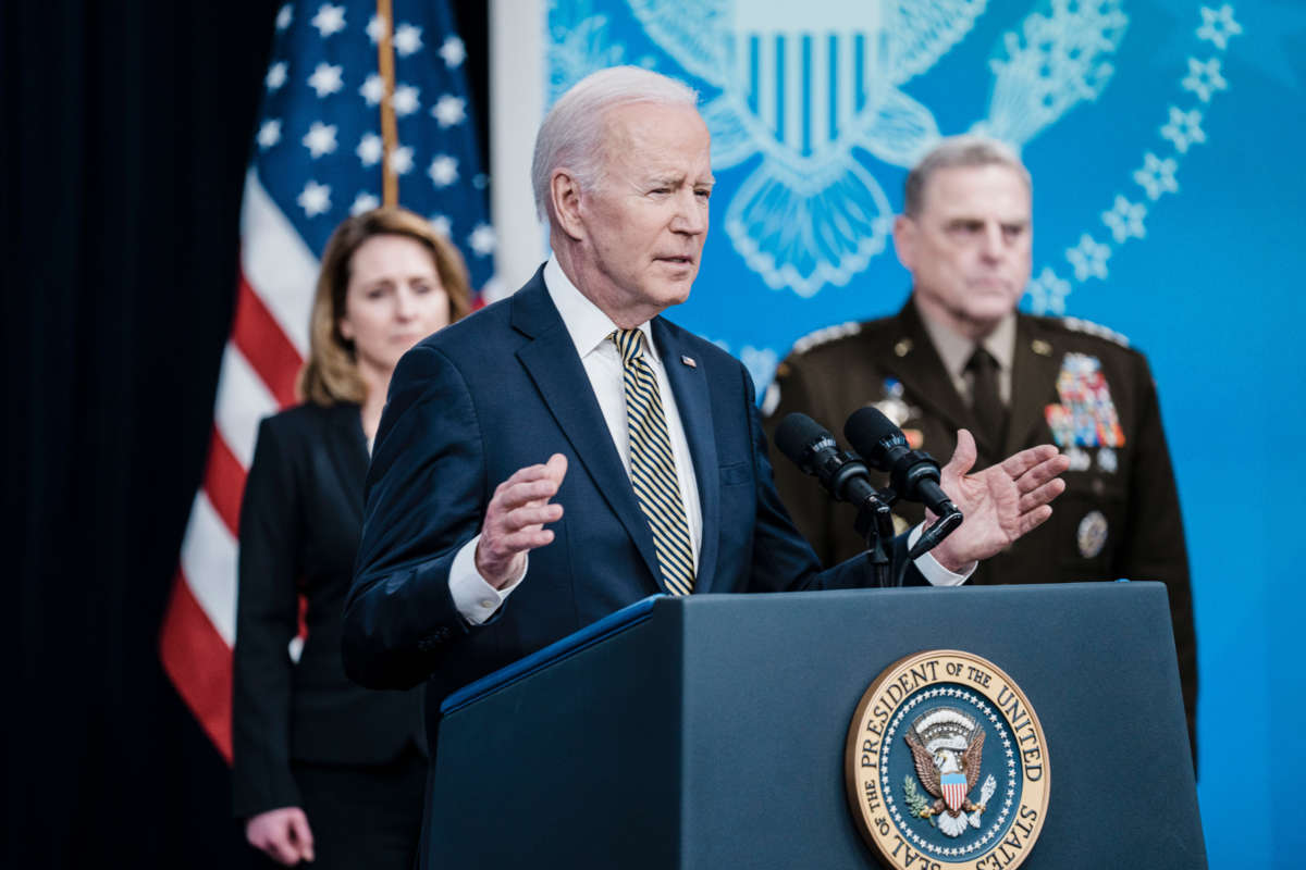 President Joe Biden delivers remarks on Ukraine, flanked by Deputy Secretary of Defense Kathleen Hicks and Chairman of the Joint Chiefs of Staff Gen. Mark Milley, from the Eisenhower Executive Office Building at the White House on March 16, 2022, in Washington, D.C.