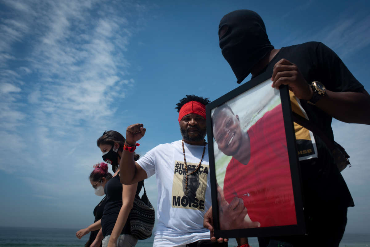 Protesters demonstrate in memory of the murder of 24-year-old Congolese Moïse Kabagambe and against violence against refugees from the Democratic Republic of Congo in Rio de Janeiro, Brazil, on February 5, 2022.