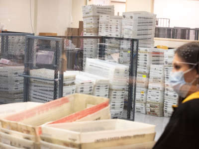 Votes wait to be counted by staff at the Maricopa County Elections Department office on November 5, 2020, in Phoenix, Arizona.