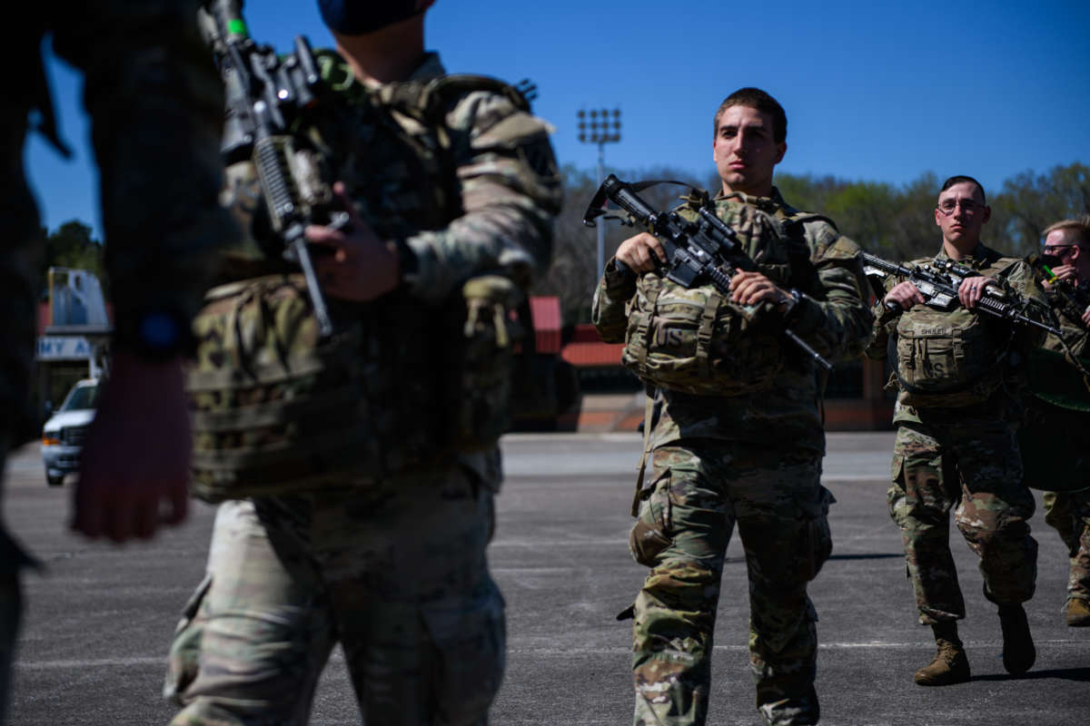 Members of the 1st Armored Brigade Combat Team, 3rd Battalion, 69th Armored Regiment deploy to Germany from Savannah, Georgia, on March 2, 2022.