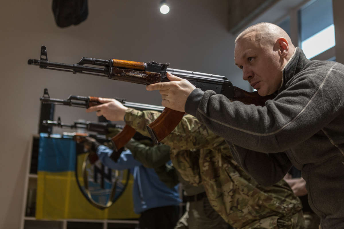 Civilian volunteers from the new group of Territorial Defense Units set up by veterans of the Azov Regiment train in a secret location in Dnipro, Ukraine, on March 6, 2022.