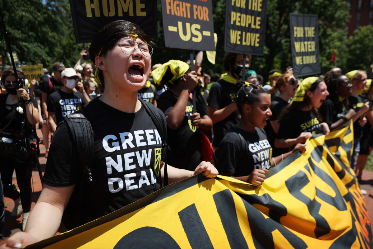 Climate Activists Protest Infrastructure Deal In Washington, DC