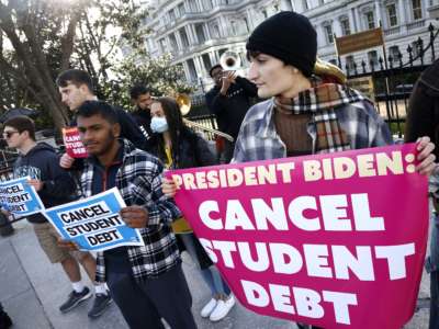 The Too Much Talent Band and local activists have a joyful protest of music and dancing outside of The White House to "Cancel Student Debt" on March 15, 2022, in Washington, D.C.