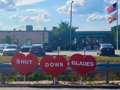 Immigrant advocates place “Shut Down Glades” hearts at Glades County Detention Center on Valentine’s Day 2022.