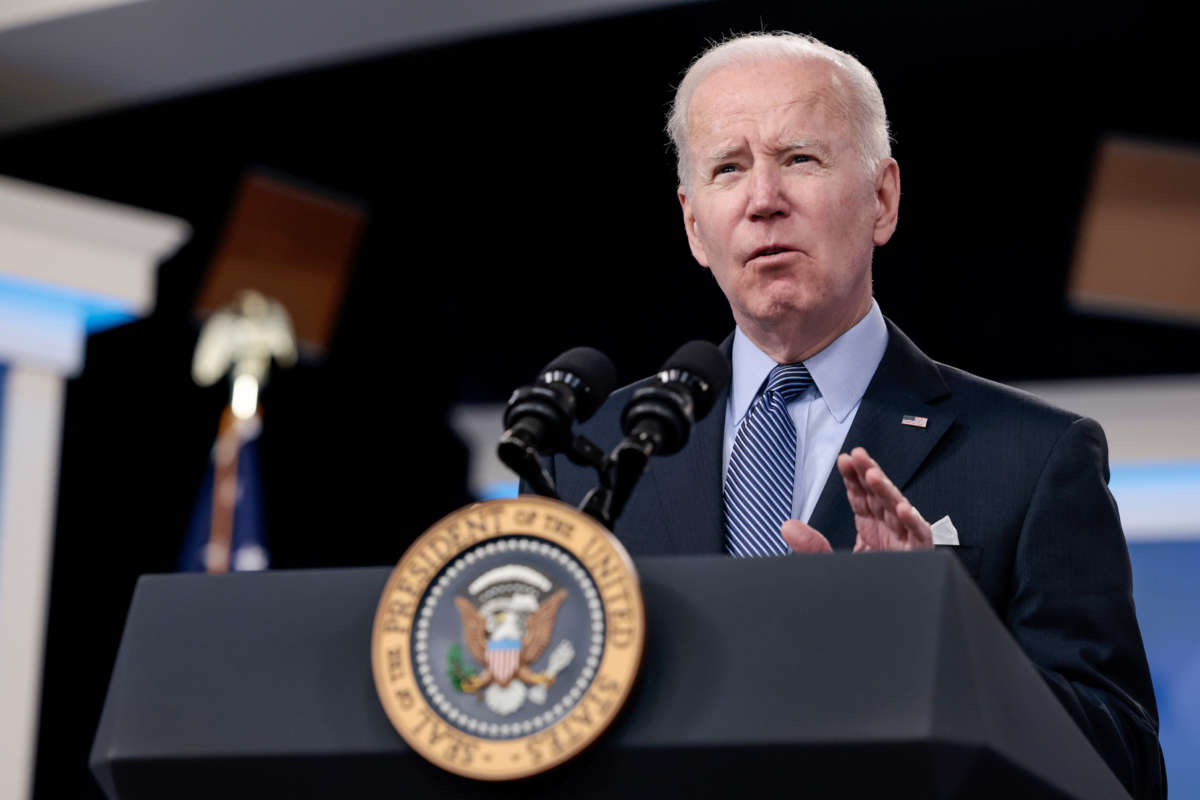 President Joe Biden gestures as he delivers remarks in the South Court Auditorium on March 30, 2022, in Washington, D.C.