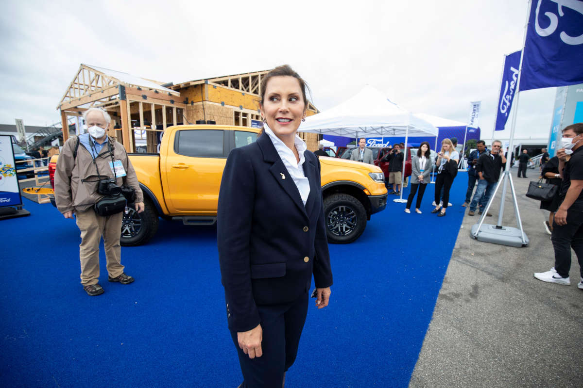 Michigan Gov. Gretchen Whitmer tours the 2021 Motor Bella auto show on September 21, 2021, in Pontiac, Michigan.