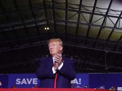 Former President Donald Trump speaks to supporters at a rally on April 2, 2022, near Washington, Michigan.