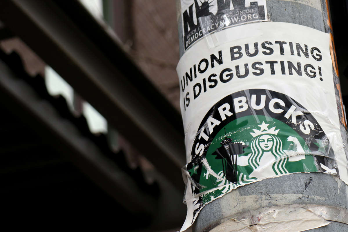 A pro-union poster is seen on a lamp pole outside Starbucks' Broadway and Denny location in Seattle's Capitol Hill neighborhood on March 23, 2022.