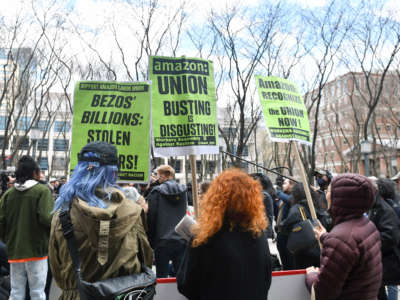 Amazon workers protest on April 1, 2022, as they vote for the unionization of the Amazon Staten Island warehouse in New York.