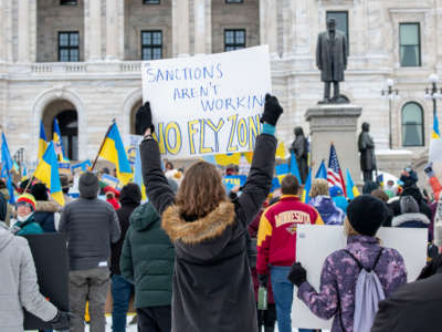 People rally to support the Ukrainian people and Ukraine's sovereignty and stop the war that Russia is waging against them in St. Paul, Minnesota, on March 6, 2022.