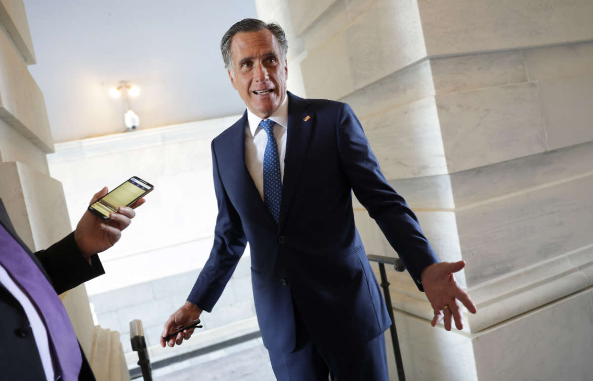 Sen. Mitt Romney speaks to the media as he arrives at the U.S. Capitol on April 25, 2022, in Washington, D.C.