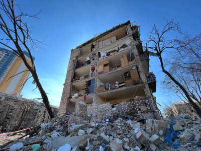 A destroyed residential building is seen in Podilskyi district of Kyiv, Ukraine, on March 19, 2022.