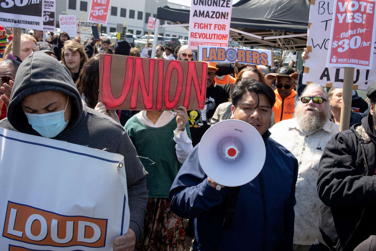 Supporters of Amazon workers attempting to win a second union election at the LDJ5 Amazon Sort Center rally on April 24, 2022, in Staten Island, New York.
