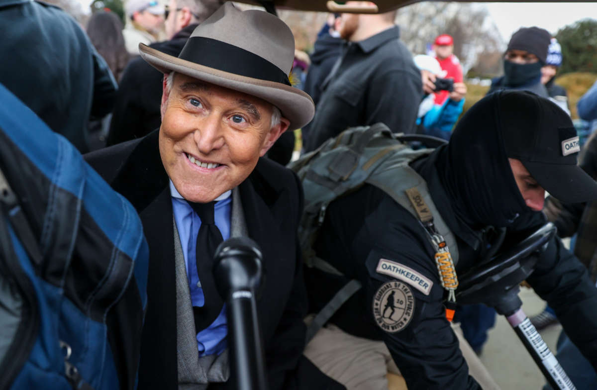 Roger Stone, former advisor to President Donald Trump, greets supporters after speaking in front of the Supreme Court on January 5, 2021, in Washington, D.C.