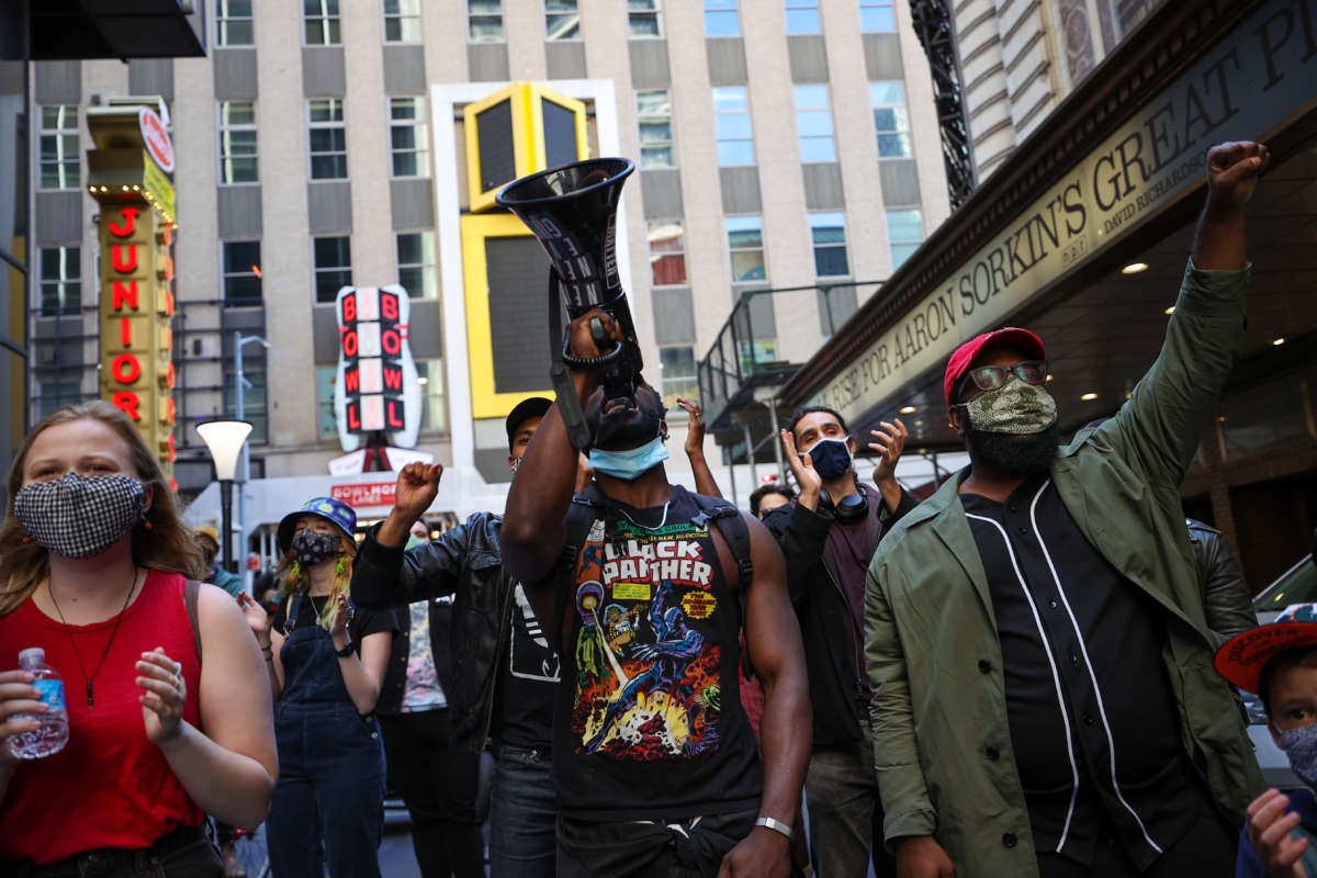Protesters take to the streets to mark May Day in New York City on May 1, 2021.