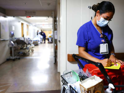 Lab technician Alejandra Sanchez works in the Emergency Department at Providence St. Mary Medical Center on March 11, 2022, in Apple Valley, California.