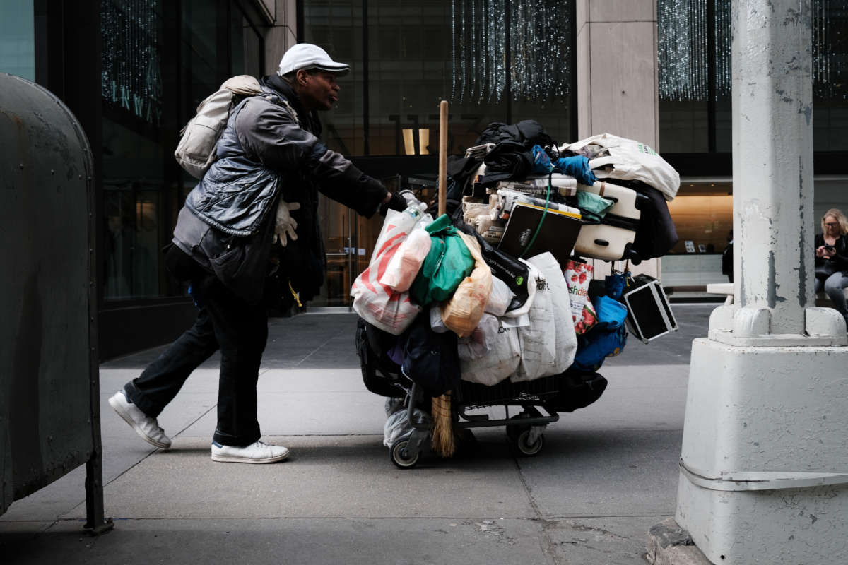 A homeless man walks through Manhattan on March 31, 2022, in New York City.