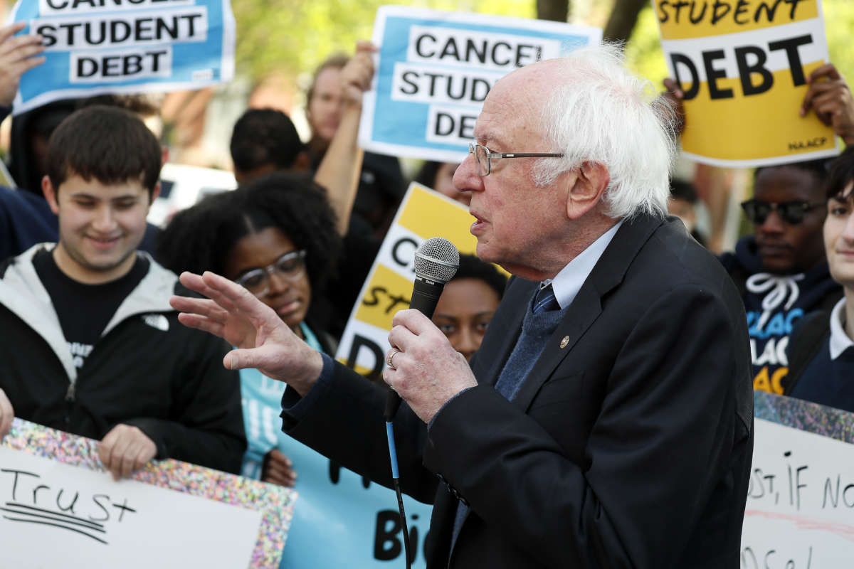 Sen. Bernie Sanders joins student debtors to once again call on President Biden to cancel student debt at an early morning action outside the White House on April 27, 2022, in Washington, D.C.
