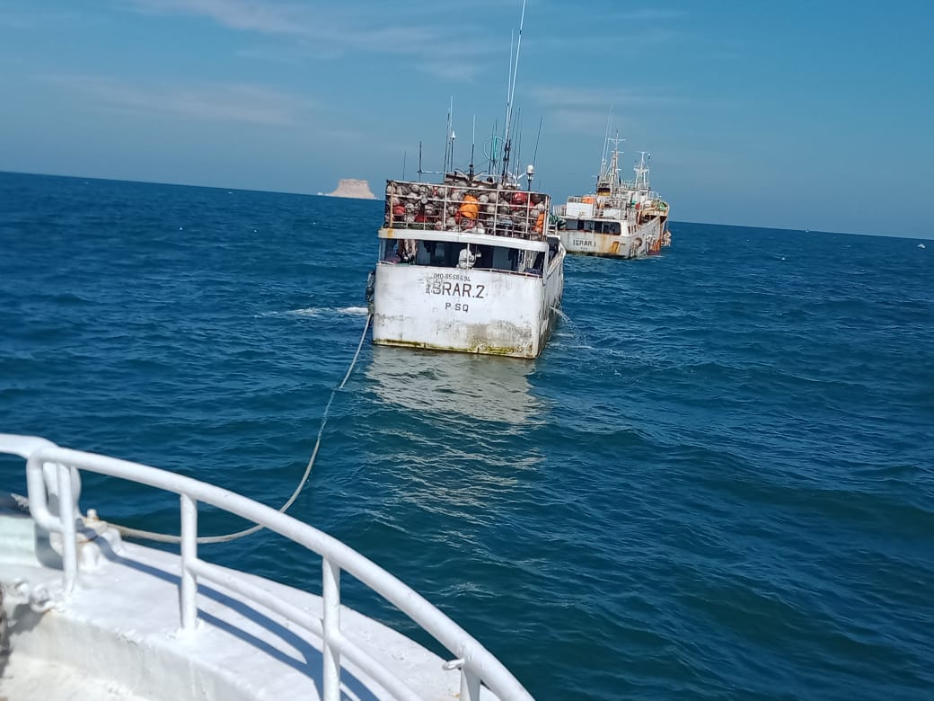 Ships float on the ocean