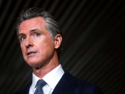 California Gov. Gavin Newsom speaks during a press conference at the Native American Health Center in Oakland, California, on December 22, 2021.