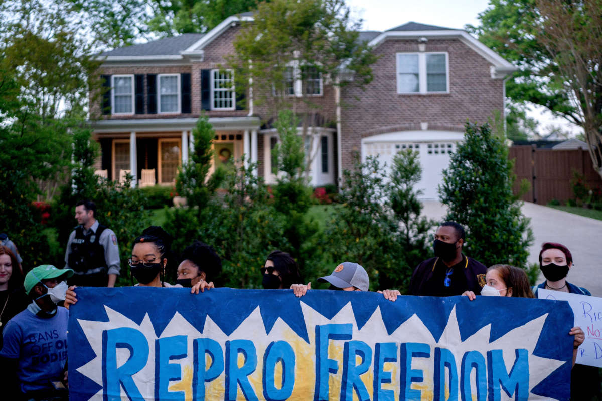 Pro-choice demonstrators gather outside the house of Supreme Court Justice Samuel Alito in Alexandria, Virginia, on May 9, 2022.