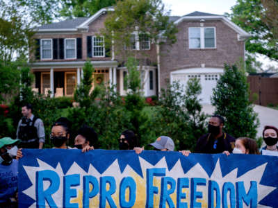 Pro-choice demonstrators gather outside the house of Supreme Court Justice Samuel Alito in Alexandria, Virginia, on May 9, 2022.