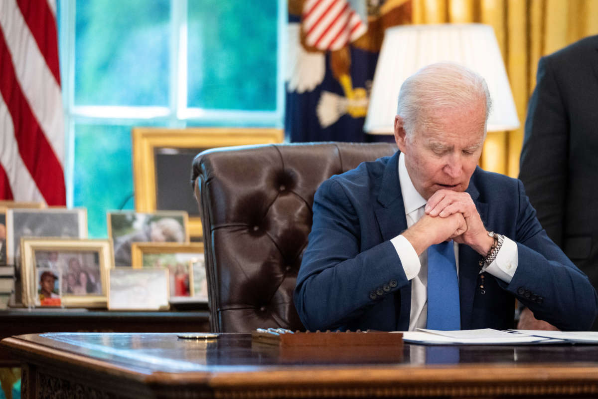 President Joe Biden speaks to reporters before signing the Ukraine Democracy Defense Lend-Lease Act of 2022 in the Oval Office of the White House on May 9, 2022, in Washington, D.C.