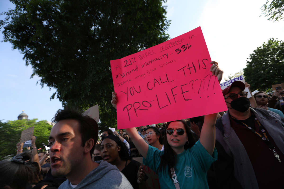 Anti-abortion and abortion rights demonstrators during a protest outside the U.S. Supreme Court in Washington, D.C., on May 3, 2022.